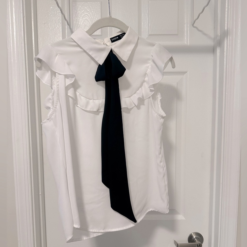 White Blouse with Black Tie Accent